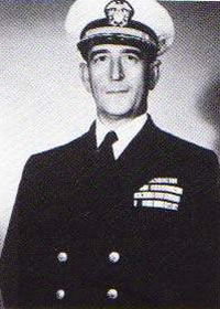 Captain Edward A. Solomons, USN Becomes Commanding Officer
