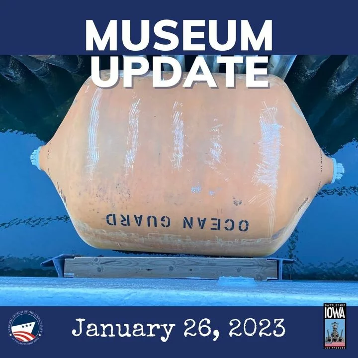 A large, strange orange object floats in the water—an OCEAN GUARD buoy, its surface appearing slightly scratched. Text above reads MUSEUM UPDATE. The date January 26, 2023 appears below with two small logos in the corners.
