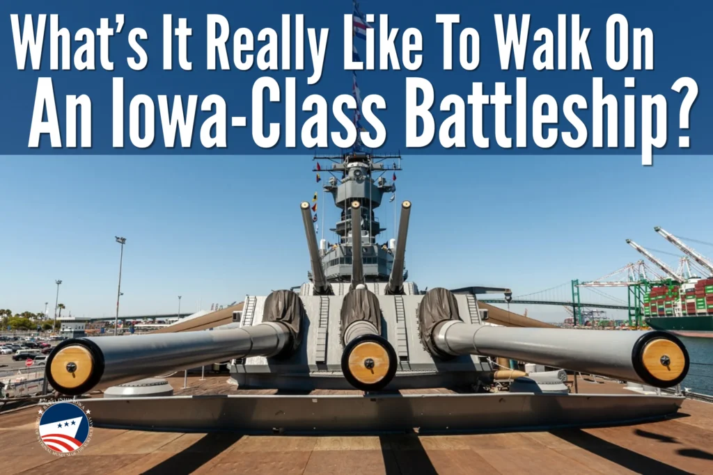 Close-up view of an Iowa-Class Battleship’s main guns, with blue sky and industrial background. Large white text at top reads, What’s It Really Like To Walk On An Iowa-Class Battleship? Navy-themed logo in bottom-left corner—perfect for anyone interested in a battleship tour or an up-close walk through this historic vessel. Close-up view of an Iowa-Class Battleship’s main guns, with blue sky and industrial background. Large white text at top reads, What’s It Really Like To Walk On An Iowa-Class Battleship? Navy-themed logo in bottom-left corner—perfect for anyone interested in a battleship tour or an up-close walk through this historic vessel.