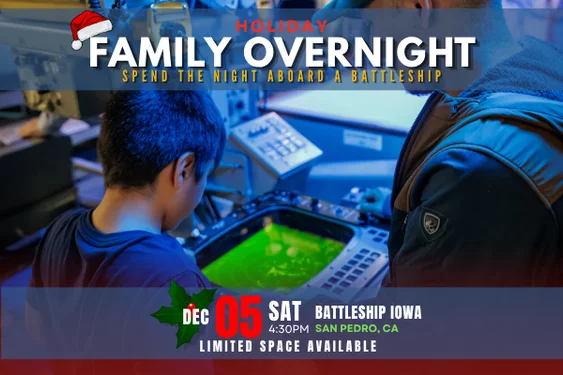 A child and adult examine equipment on a battleship. Text: Holiday Family Overnight. Dec 5 Sat 4:30pm. Battleship Iowa, San Pedro, CA. Limited space available. Join us for a memorable family adventure and spend the holiday night aboard a battleship.