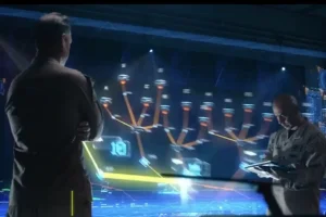 Two people in military uniforms stand in front of a large, futuristic digital display with networked nodes and data, examining information, one holding a tablet.